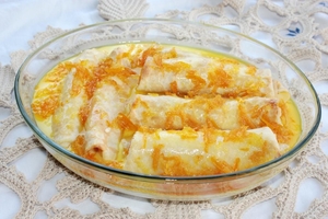 Как приготовить блины с творогом и апельсиновым соусом
