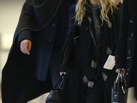 Мэри-Кейт Олсен и Оливье Саркози публично предаются чувствам