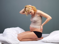 Месячные во время беременности: В чем причина