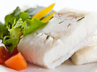 Тушеный палтус на овощной подушке