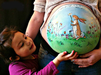 Рисунки на животе беременных: ТОП-20 фото