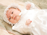 Что подарить ребенку на крестины