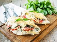 Свинина, запеченная с помидорами и моцареллой