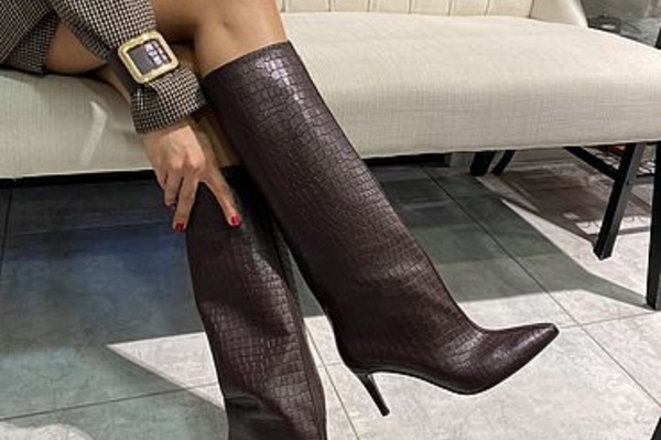 Модные сапоги на небольшом каблуке весна 2022 / Getty  Images