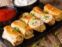 Рецепт дня: блинчики с курицей в соусе бешамель