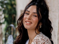 Огневич в пестром платье и ботфортах поведала, чем для нее особенный Львов