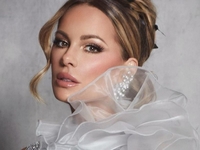 Кейт Бекинсейл устроила развлечения с сенбернаром в спортзале